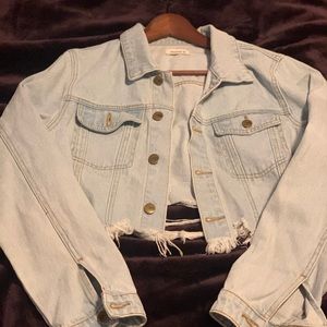 Destroyed denim jacket